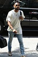 Miguel arrives at a downtown hotel in New York Cit