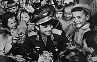 Yuri Gagarin with young Muscovites.

Supplied By