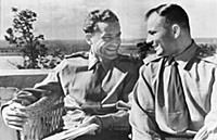 Yuri Gagarin, and Gherman Titov talk over experien