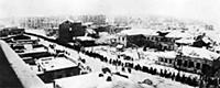 A long line of German prisoners of war file throug