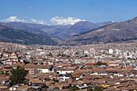 PERU / Cusco / View across roofs of Cusco from Pla