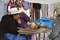 PERU / Puno / Street vendor selling meat and goat 