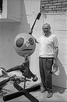 2765065 Joan Miro with one of his sculptures at th