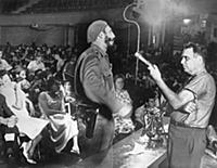 1143945 Castro Interviews Insurgents (b/w photo); 