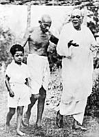 2634945 Mahatma Gandhi walking with a boy and Sara