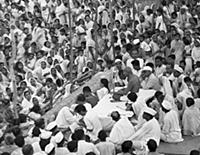 2656376 Gandhi speaking in front of large crowd (b