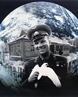 3906850 Cosmonaut Yuri Gagarin Holding a White Dov