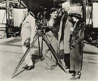 937171 Charlie Chaplin behind the camera, c.1928 (