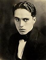 828941 Portrait of Charlie Chaplin, c. 1918 (sepia