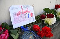 16.04.2019 Flowers are laid next to the French Emb