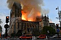 Smoke billows from Notre Dame Cathedral after a fi