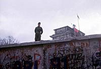 Fall of the Berlin Wall: a miltaire on the Wall. N