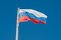 Russian state flag waving in the wind against the 