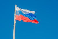 Russian state flag waving in the wind against the 