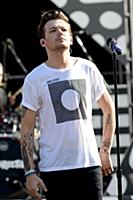 Louis Tomlinson of One Direction performs on Good 