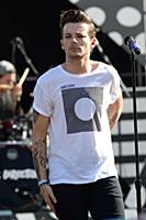 Louis Tomlinson of One Direction performs on Good 