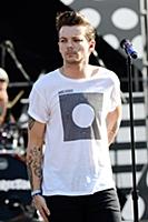 Louis Tomlinson of One Direction performs on Good 