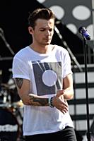 Louis Tomlinson of One Direction performs on Good 