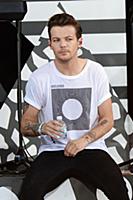 Louis Tomlinson of One Direction performs on Good 