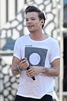 Louis Tomlinson of One Direction performs on Good 