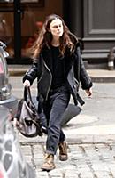 Actress Keira Knightley wears a sheepskin flying j