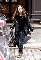 Actress Keira Knightley wears a sheepskin flying j