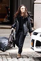 Actress Keira Knightley wears a sheepskin flying j