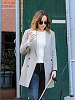 Actress Dakota Johnson walks her dog Zeppelin in t
