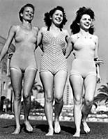 Three young women modelling swimsuits in 1942