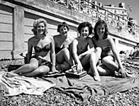 Four girls enjoyng the sea air at Brighton , Susss