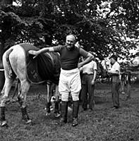 Jimmy Edwards, actor and comedian during a polo ma
