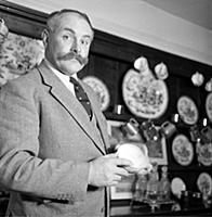 Jimmy Edwards, actor and comedian, at home.