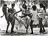 George Best plays barefoot beach football with loc