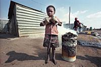 Picture by Roger Bamber : Barefoot Township kid in