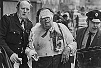 A barrister being helped to safety after the IRA -