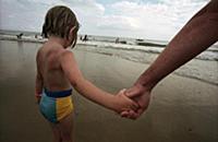 A child and her father on Bournemouth beach where 