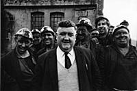 Miners and a foreman at the pithead of Clydach Val