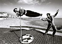 An illusionist performing the Indian Rope Trick on