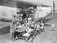 Air liner as seaside cafe .
A six seater air line