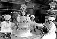 Icing a wedding cake at CWS Limited, Biscuit Works