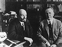 V I Lenin having a talk with P Christensen , an Am