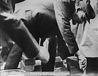 V I Lenin laying the foundation stone of a tempora