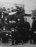 Petrograd's Armed Workers pose at the Armoured Veh