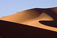 People climbing a sand dune, Namib Desert, Sossusv