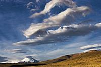 Clouds over altiplano and the Parinacota Volcano, 