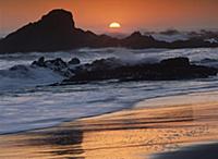 Crashing surf on rocks at sunset, Point Piedras Bl