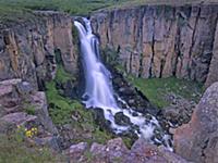 North Clear Creek Falls cascading down cliff, Colo