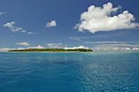 Clouds above sea and coral atoll, Alphonse Island,