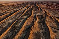 Parallel sand dunes in desert, Simpson Desert, Nor