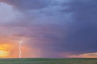 Lightning strike over prairie, Badlands National P